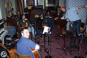 The band at work in Akademie Mathematique. Smokey Hormel is closest to the camera, Mike Campbell behind him and to the left, Johnny Polonsky is at the rear and Matt Sweeney right.