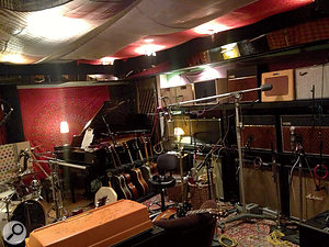 John Shanks's room at Henson is stuffed to the gills with guitars and other instruments. Note the wall of amplifiers to the right!