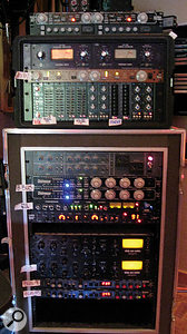 This rather fuzzy photo shows the labels illustrating how some of the other outboard gear was assigned. Visible from top are Empirical Labs EL7 Fatso tape simulator, SSL compressor, a pair of Universal Audio LA3A compressors, another EL7, a rack of API EQs, Neve 33609 compressor, a pair of Empirical Labs Distressor compressors, API 2500 compressor, Eventide 2016 reverb, Slate Dragon compressors (x2) and Lexicon PCM42 delay (x2). 