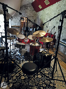 Drummer Morgan Simpson used two kits during the tracking of Black Midi’s Cavalcade at Hellfire Studios. Unusual mic choices include the Electro‑Voice DS35 dynamic mic on snare (red kit) and rack tom (white kit).