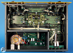 The internal layout is neat and tidy, with ribbon cables joining the various PCBs. You can see the two NOS 6N2P-EW tubes on the centrally positioned PCB.