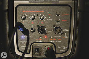 The rear panel hosts the inputs and a basic mixer.  Note the safely recessed push‑button switches for selected controls.