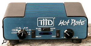 If you must use a large tube amp, a power soak such as the THD Hot Plate pictured here will allow you to drive the amp harder without increasing the overall volume.