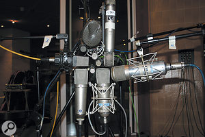 If mics have the same polar pattern and are placed at the same distance from the source, they’ll pick up the same balance of direct and reflected sound, no matter whether they are dynamic or capacitor designs. 