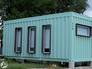 People have used shipping containers for all kinds of things, and one could, indeed, be used as a studio! However, unless you specifically wanted it to be easily transportable, the amount of work that would be needed to make such a container into a usable studio would probably be excessive.