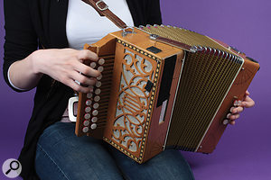 Accordions produce sound from two places — on most models from 'treble' and 'bass' ends — so it's important to recognise this when miking and set two microphones either side and slightly forward of the instrument.