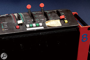 The distinctive remote control for an EMT 250 digital reverb, and two of the 2254/A compressor modules on Studio A's vintage Neve desk.