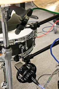 The initial plan for snare close-miking was to place an AKG C414 B-ULS on the bottom and a Beyerdynamic M201 on the top, with one polarity-inverted. It's a combination that often works, but it didn't seem to acquit itself so well on this piccolo, and in the end Matt was able to get a fuller, more natural sound using a pair of C414 B-ULS in the same configuration.