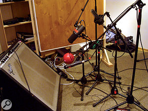 In this picture, you can see how the five close mics were arranged for the overdubbing session. Closest to the amp were a Blue Kickball and a Shure SM57; a Shure SM7B and an Electrovoice RE20 were set up a little further back; and an AKG C414B XLS was bringing up the rear.