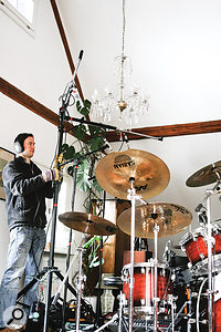 For the song 'Sascha', I repurposed the big lighting stand to hold the cardioid room mics, positioning them only a little higher than the omnidirectional overheads so that they subtly filled out the overall drum sound without adding too much additional reverb tail. The chandelier positioning was also crucial, naturally...