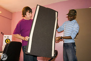 If you're renting, you can avoid upsetting your landlord by sticking adhesive strips to the back of acoustic foam panels and using these to mount them, so that there will be no messy glue marks on the walls.