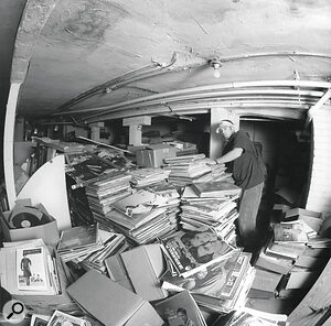 When it comes to crate digging, DJ Shadow may be the all‑time master. Seen here in his natural habitat, the basement of Sacramento’s Rare Records.