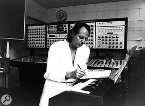 The WDR Electronic Studio also housed an EMS Synthi 100 modular synthesizer; this photo shows the composer during the production of his piece <em>Sirius</em>. 