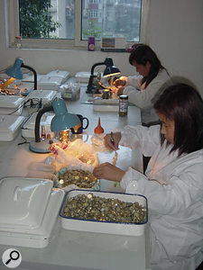 Capsule assembly taking place at one of the former government-owned factories in Shanghai.