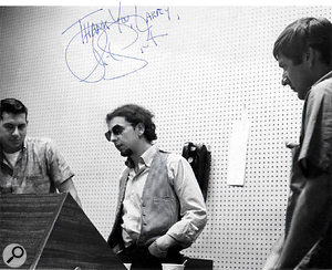 Levine, Spector and Sonny Bono at the desk — signed 'Thank you Larry' by Spector.