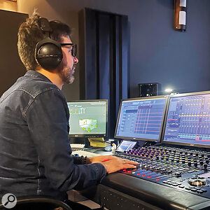 Immersive audio designer Toco Cerqueira at a Dolby Atmos 9.1.6 workstation with JBL C221 monitors, 308P MkII surrounds, and Avid S6 M10 controller. Estúdio JLS have a second Dolby Atmos mixing room under construction.