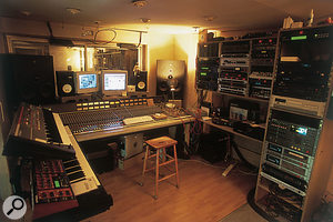 Tony Colman's studio. The live area is behind the DDA desk; equipment racks are to the right, while Roland Juno 106 and Access Virus kb synths are visible to the left.