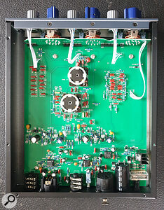 The mid band of the EQ‑73 is based on a pair of Carnhill inductors.