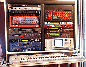 The main equipment rack in the new second studio. From top, left to right: Steinberg Midex 8 MIDI interface, Focusrite Platinum Trakmaster input channel, MOTU 2408 Mk II audio interface, Clavia Nord Rack, Quasimidi Sirius, Waldorf Microwave, Emu Proteus 2000 and Novation Supernova synths; Access Virus B synth, Korg TR-Rack, Emu Planet Phatt, Roland XV3080 and JV1080 sound modules, Akai S6000 sampler.