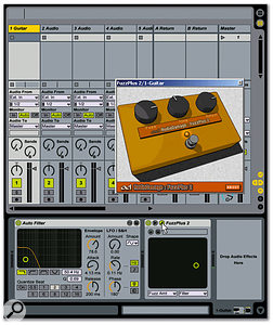 The track called 'Guitar' is selected and the Track view is visible, which shows the plug-ins inserted into this track — the Auto Filter that comes with Live and the AudioDamage FuzzPlus 2 free VST plug-in. Note that the FuzzPlus 2's GUI is available for editing, because the cursor has clicked on the plug-in's 'Edit Panel' button (the one that looks like a wrench).