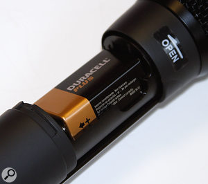 The 9V battery inside the hand-held mic powers its transmitter.