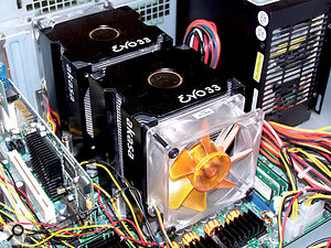 Stock CPU coolers can be replaced with more efficient models for quieter performance. Here, on a Tyan S2875 dual-Opteron motherboard, two Akasa heatsinks have their fans mounted in a push-pull configuration.