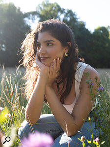 Moni Blue, the artist featured in the audio examples.