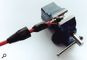 Make sure that your connector is securely fastened in a vice or clamp to stop any movement while you solder. Make sure that your connector is securely fastened in a vice or clamp to stop any movement while you solder.