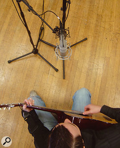 There's no reason why you can't use a spaced pair of mics alongside a coincident pair, such as the Mid/Side arrangement shown here. But when recording a single instrument it can have little effect, unless you are specifically trying to capture a lot of ambience from a reverberant room. Using the Mid/Side approach has advantages over a crossed pair, as you can get a full, on-axis sound from the centre mic, with the sides of the figure-of-eight adding some 'space' to the sound. There's no reason why you can't use a spaced pair of mics alongside a coincident pair, such as the Mid/Side arrangement shown here. But when recording a single instrument it can have little effect, unless you are specifically trying to capture a lot of ambience from a reverberant room. Using the Mid/Side approach has advantages over a crossed pair, as you can get a full, on-axis sound from the centre mic, with the sides of the figure-of-eight adding some 'space' to the sound.