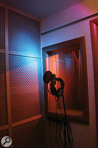 Vocal booth: the entire wall behind the vocal position is a shallow rockwool trap with more fretwork MDF on the front.