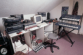 Declan's main writing area provides easy access to all his gear, including the outboard and mastering rig, the Korg MS2000 and Roland JP8000 synths and the G3 Mac.
