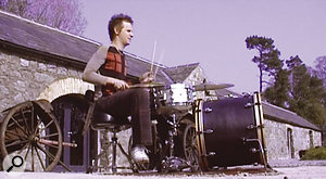 A less successful experiment: Dominic Howard plays drums outdoors in the Grouse Lodge courtyard.