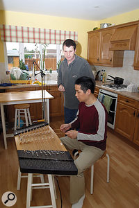 The bright ambience of Li's kitchen was ideal for recording Li's traditional yangqin.