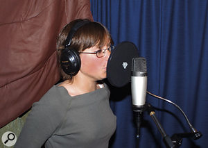 Charlotte's vocal and sax sounds had been suffering from being recorded using an SM58 in the less-than-ideal acoustic environment of the control room. Using a comparatively low-cost condenser mic in the live room, with drapes and duvets damping the corner behind the performer, immediately offered a much more usable sound in both cases — hardly any EQ was necessary once these measures had been taken, although a pop shield was needed in both cases.