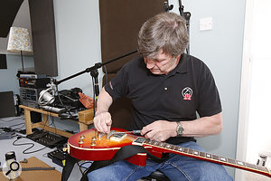 Paul White has a word with one of Paul Allen’s guitars...