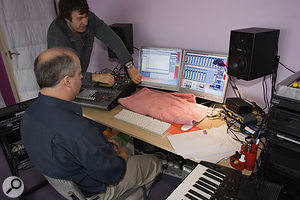 Reflective desk surfaces can cause major problems with the stereo image. While not the best permanent solution, a towel can be used to find out how bad such problems are, before you either remove the reflective surface or, as in this case, replace the towel with more acoustic foam.