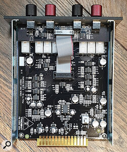 The white switch in the bottom-right of the picture links adjacent modules for stereo operation.